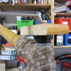 Top cup, in initial position but not yet in place