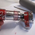 My second solution to improve the fitting (tighter) was to slightly increase the diameter of the expanding sleeves by wrapping them with a thin aluminium strip cut from a coke can - it ultimately failed as it was not thin enough and the bb would not fit into the shell