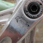 A closeup of the chainset, showing the Shimano 600 Arabesque engraving which is a hallmark of the model